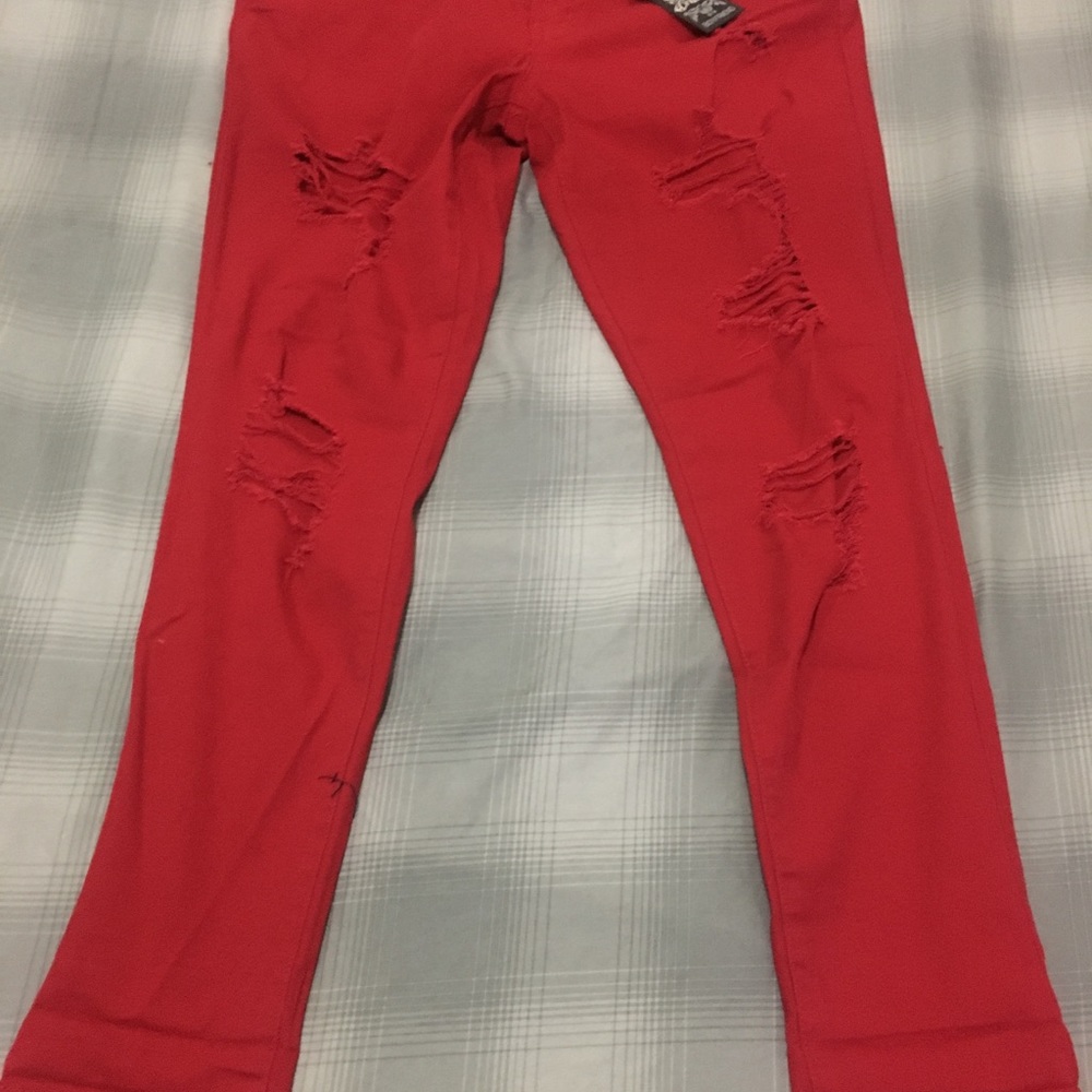 Red ripped jeans